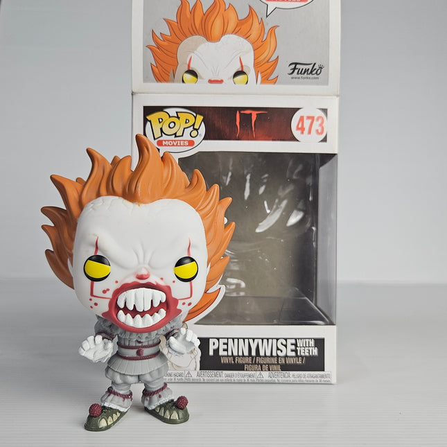 Funko Pop! Movies IT Pennywise With Teeth #473 vinyl figure with original display box in very good pre-owned condition.