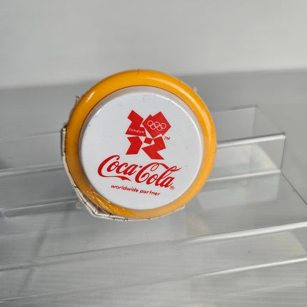Official Coca-Cola London 2012 Olympic Games promotional yellow yo-yo factory sealed in original packaging with London 2012 logo and Coca-Cola Worldwide Partner branding.