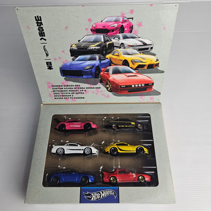 Hot Wheels Japanese Car Culture 6-car gift pack featuring Pandem Subaru BRZ, Acura Integra GSR, Mitsubishi 3000GT VR-4, Toyota GR Supra, Nissan Z and Mazda RX-7 FC Pandem in collector display packaging.