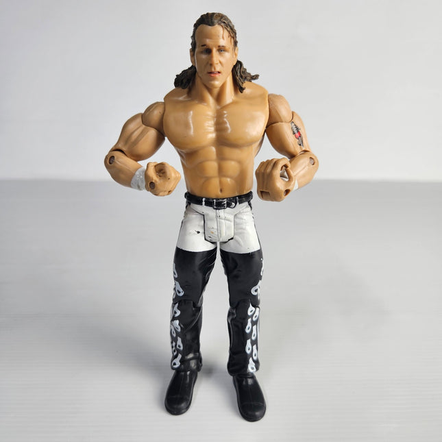 Front view of pre-owned WWE Shawn Michaels 2004 Jakks Pacific articulated action figure wearing black and white ring tights.