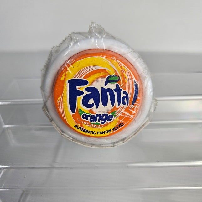 Vintage Authentic Fanta Orange Coca-Cola promotional yo-yo factory sealed in original plastic packaging with classic orange logo design.