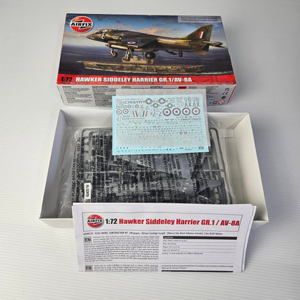 Open Airfix Hawker Siddeley Harrier kit showing parts decals and instructions