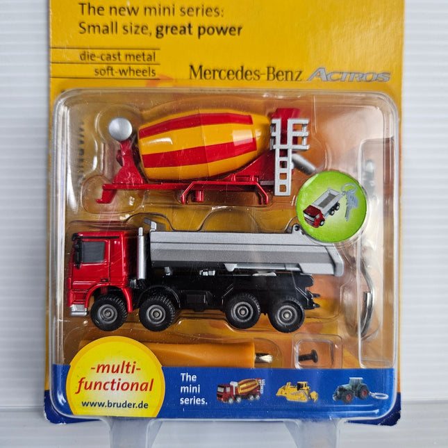 Close view of sealed Bruder mini Mercedes-Benz Actros cement mixer and keychain accessories