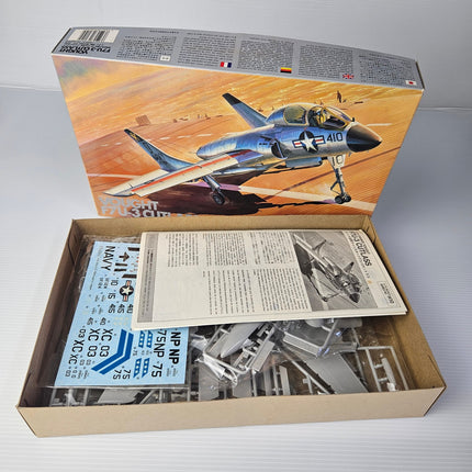 Open Fujimi Vought F7U-3 Cutlass model kit showing complete contents