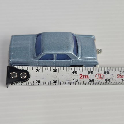 Overhead side view showing the 60 mm length of the blue Fun Ho Holden HR Sedan