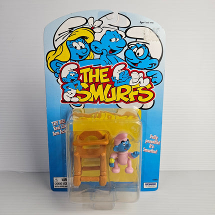 Factory-sealed Irwin The Smurfs Baby Smurf figure with high chair, front card view