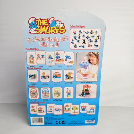 Back of Handy Smurf Animated card showing the 1996 Smurfs toy range