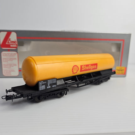 Lima 302904 yellow Shellgas HO tank wagon showing side branding and underframe detail.