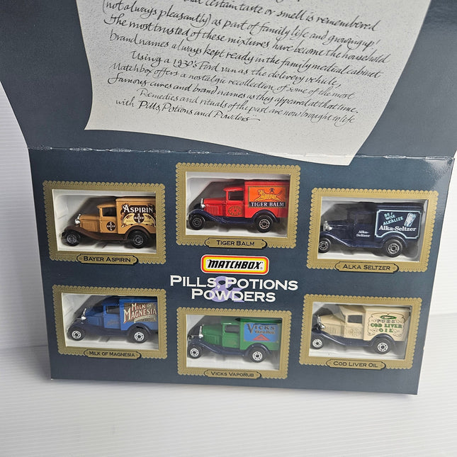 Six Matchbox Ford Model A medicine advertising vans in Pills Potions and Powders display box