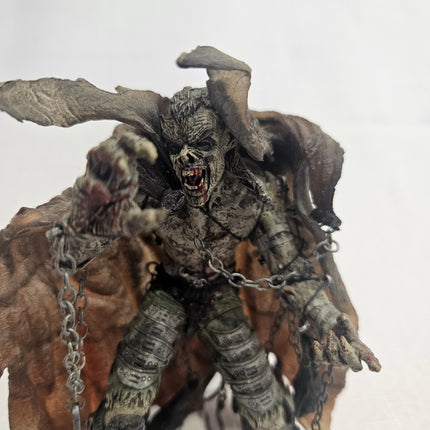 Close-up of McFarlane’s Monsters Bloody Dracula 2002 action figure showing detailed face, chains and bat accessory