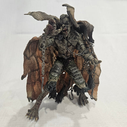 McFarlane’s Monsters Bloody Dracula 2002 action figure with chains and tattered cape front view