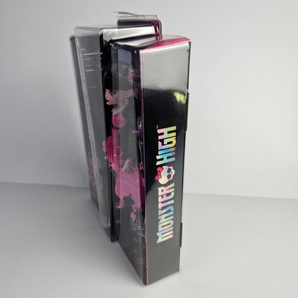 Side of Monster High Draculaura HRP64 packaging showing character artwork and product details