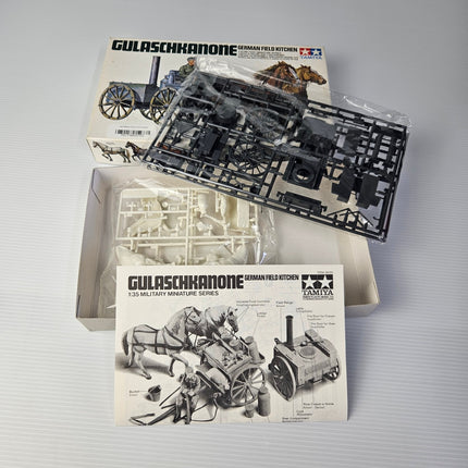 Open Tamiya German Field Kitchen kit showing complete unassembled contents