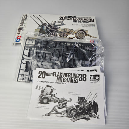 Open Tamiya 35091 Flakvierling 38 kit showing sprues and instructions