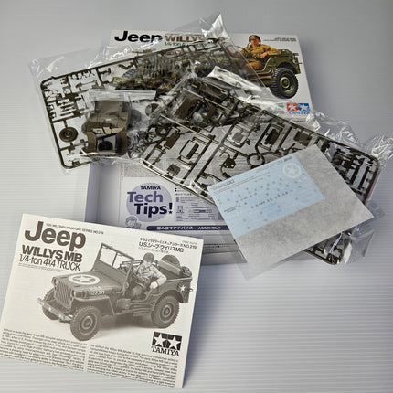Open Tamiya Jeep Willys MB kit showing complete unassembled contents