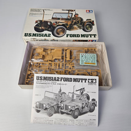 Open Tamiya M151A2 Ford MUTT kit showing complete unassembled contents