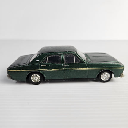 Right-side view of green Trax 8005 Ford XT Falcon GT with gold stripes