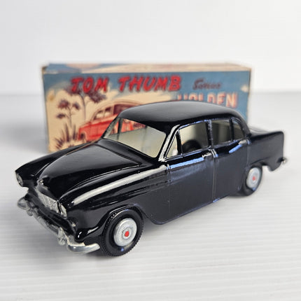 Vintage Streamlux Tom Thumb Holden FE Sedan black diecast model with original illustrated box