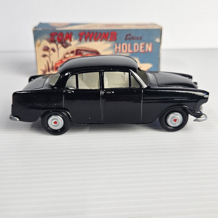 Vintage Streamlux Tom Thumb Holden FE Sedan black diecast model side view 2 with original illustrated box