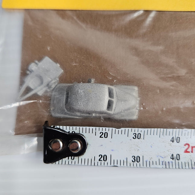 Close-up of the smaller casting and sprue components included with the Weico Holden FX kit