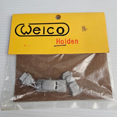 Close-up of Weico Holden FX Sedan N-scale white-metal body and kit components