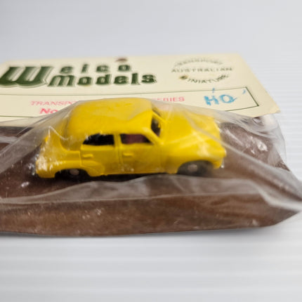 Side view of yellow Weico Models F.J. Holden sedan 1:87 HO-scale white-metal miniature